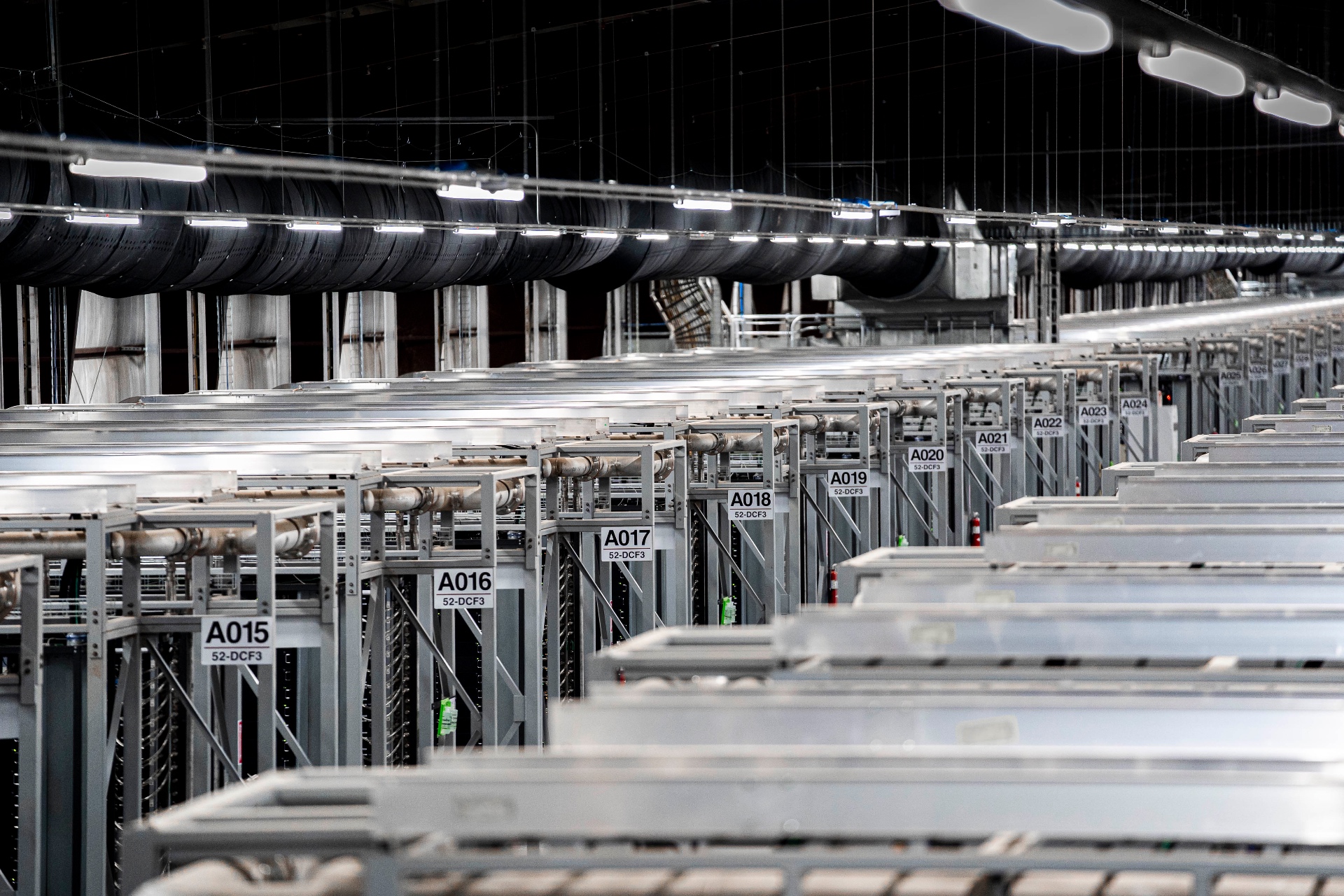 American Bitcoin's actual mining racks in an industrial facility