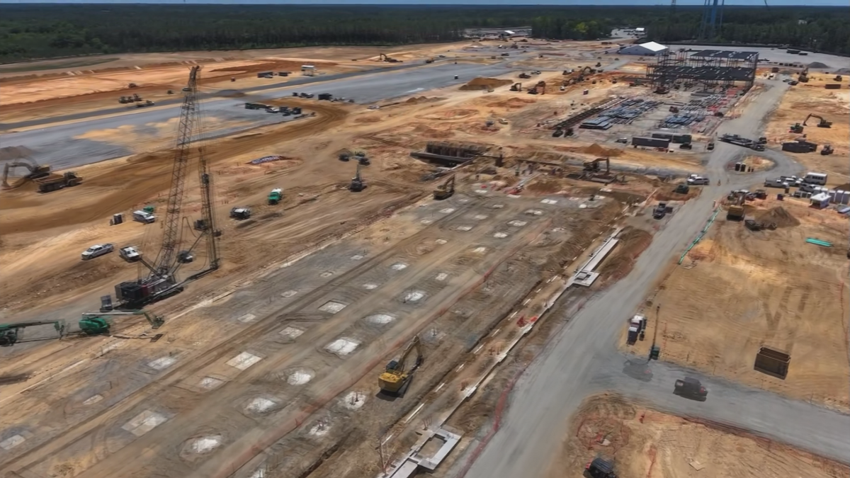 Aerial photograph of cranes and foundations at the Amazon Richmond County campus construction site