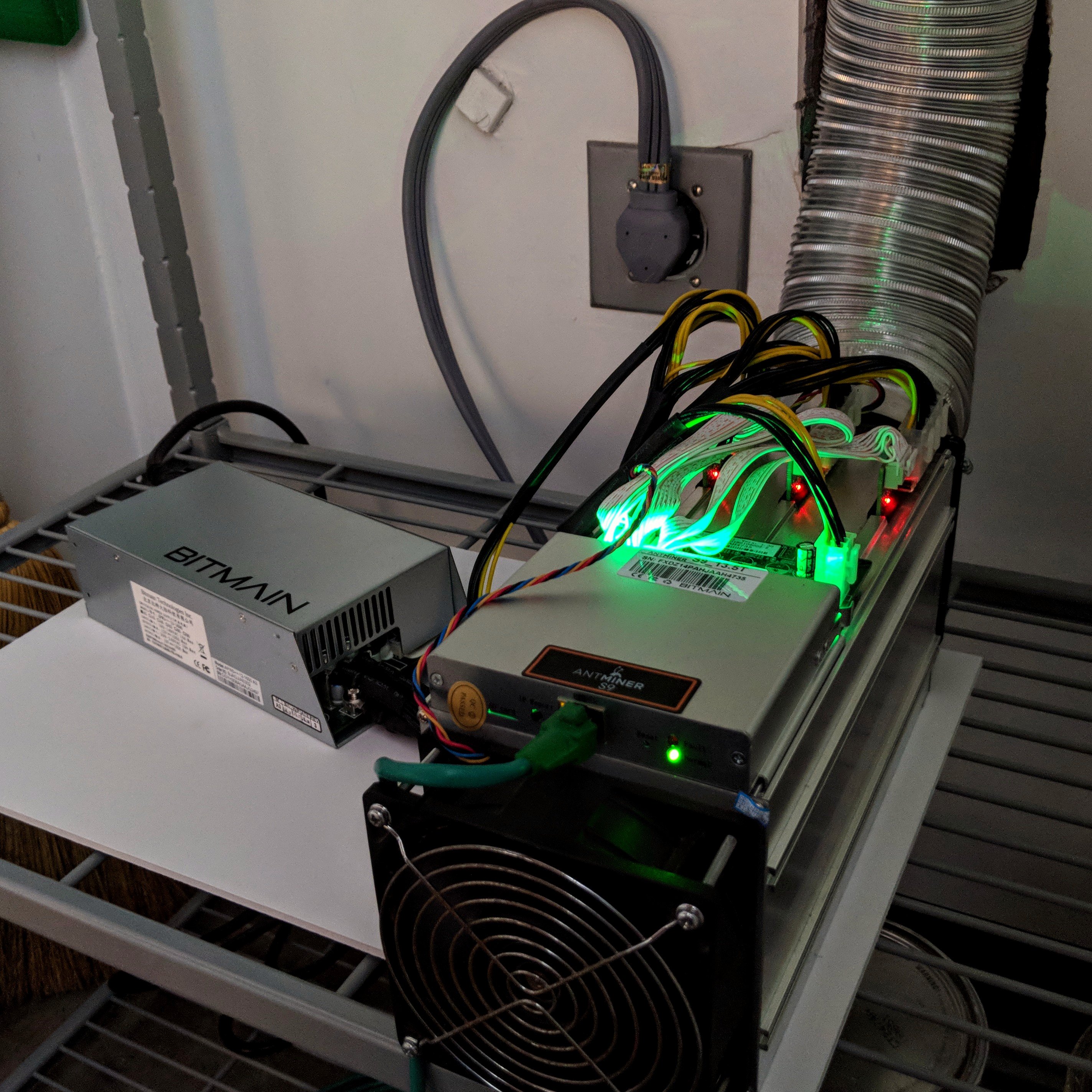 Real Bitmain Antminer S9 mining hardware with exposed board-level components