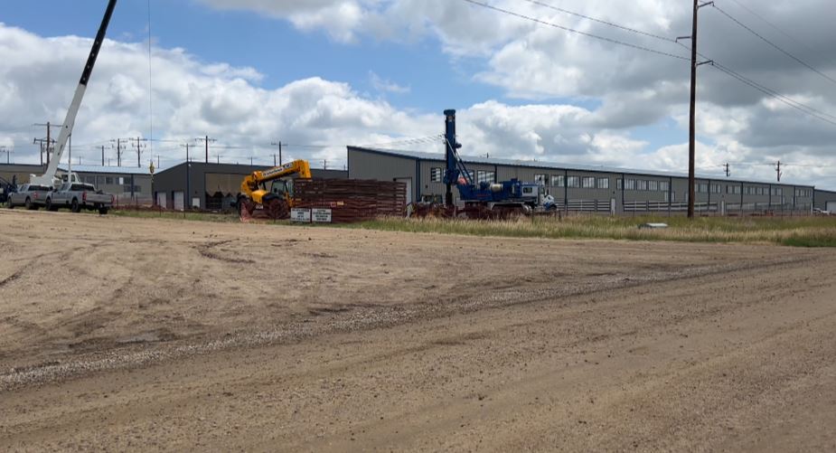 Atlas Power facility buildings and sound barrier construction near Williston, North Dakota