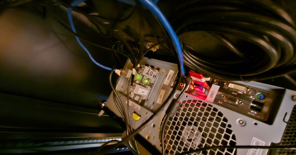 Rear of a server with Ethernet and serial connectivity, used as the featured image for an out-of-band management lesson.