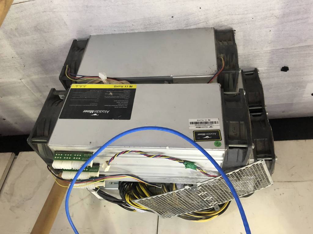 Bitcoin mining hardware operating in a mining setup.