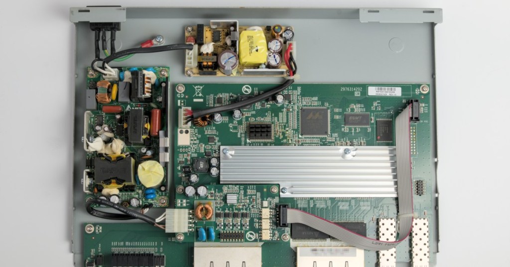 A Power over Ethernet network switch representing PoE infrastructure used for cameras, access points, sensors, and management devices around Bitcoin mining sites.