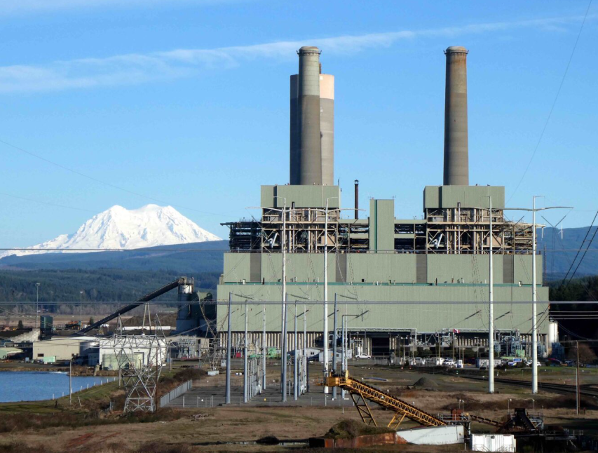 Centralia generating station twin smokestacks and transmission equipment in Washington in February 2026