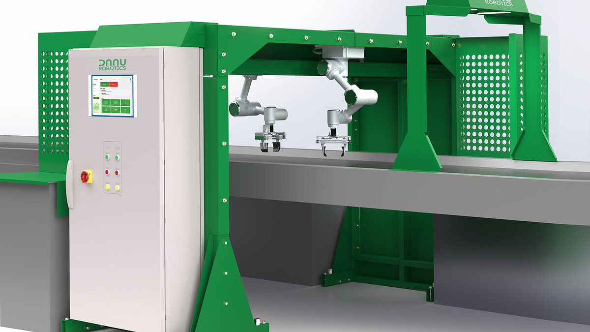 Danu Robotics dual-arm waste sorting system with green gantry, conveyor and industrial control cabinet