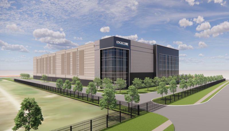 Architectural illustration of an EdgeCore data center building with a gray facade, glass entrance and landscaped security fence