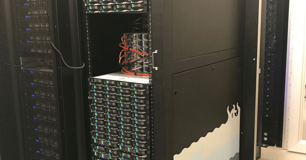 A GitHub compute cabinet filled with servers in a data center