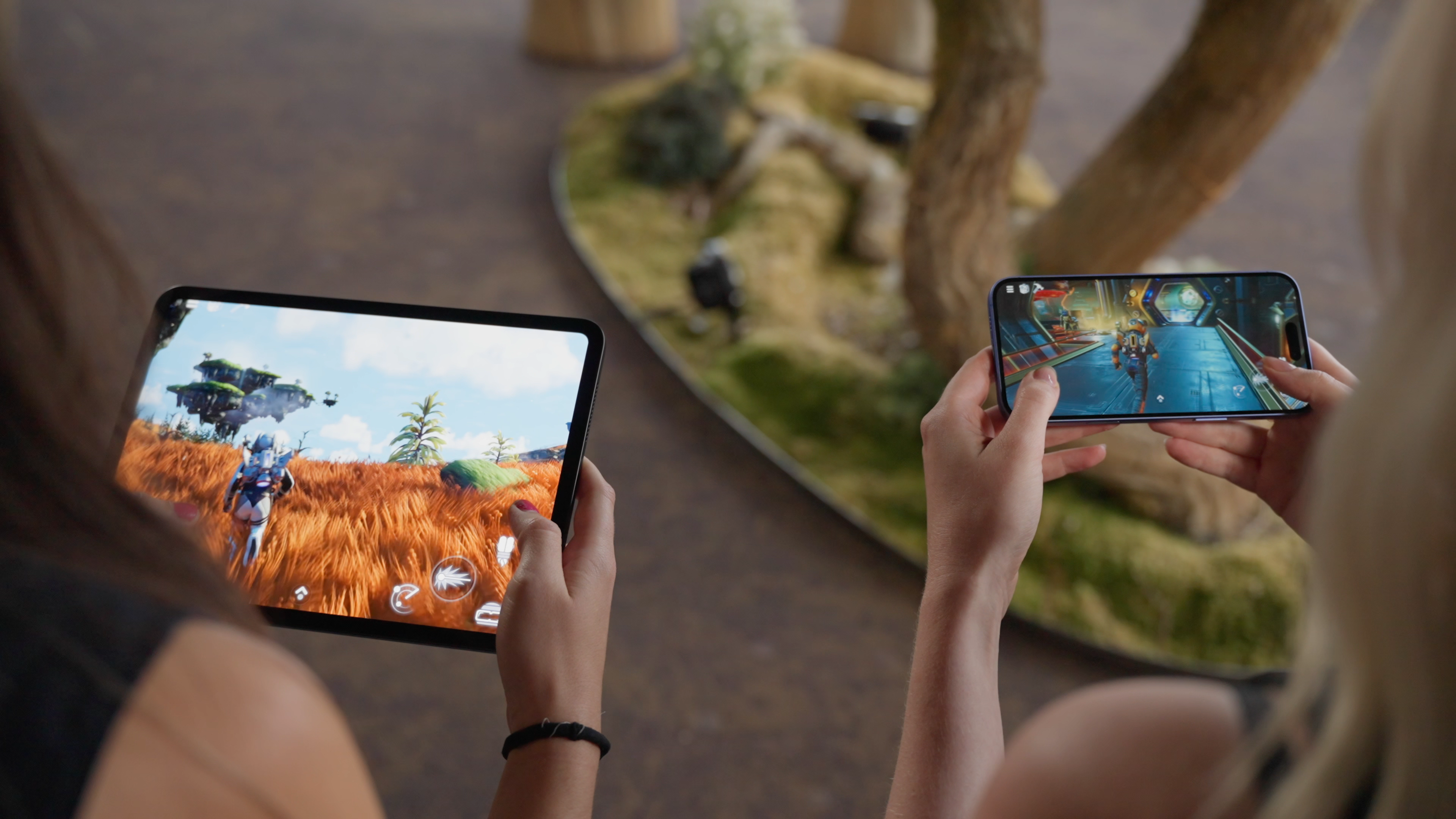 Players running No Man’s Sky on a tablet and smartphone using touch controls