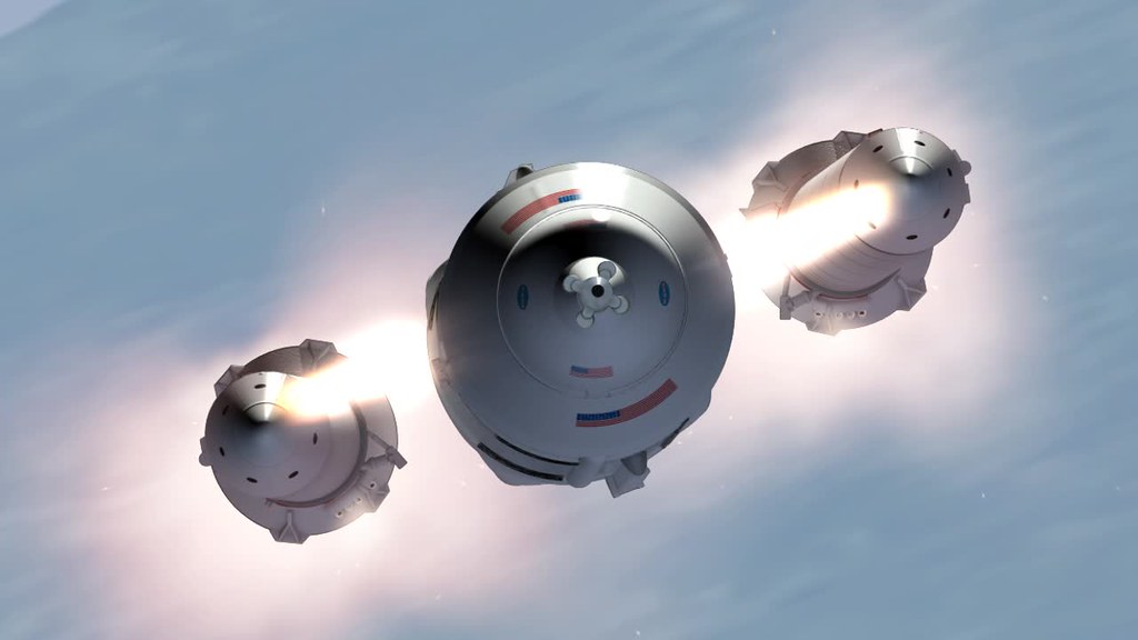 NASA artist concept showing Space Launch System boosters separating from the rocket during ascent.