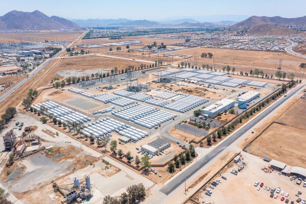 Aerial view of Calpine Nova Power Bank in Menifee California with rows of white battery containers and electrical substations