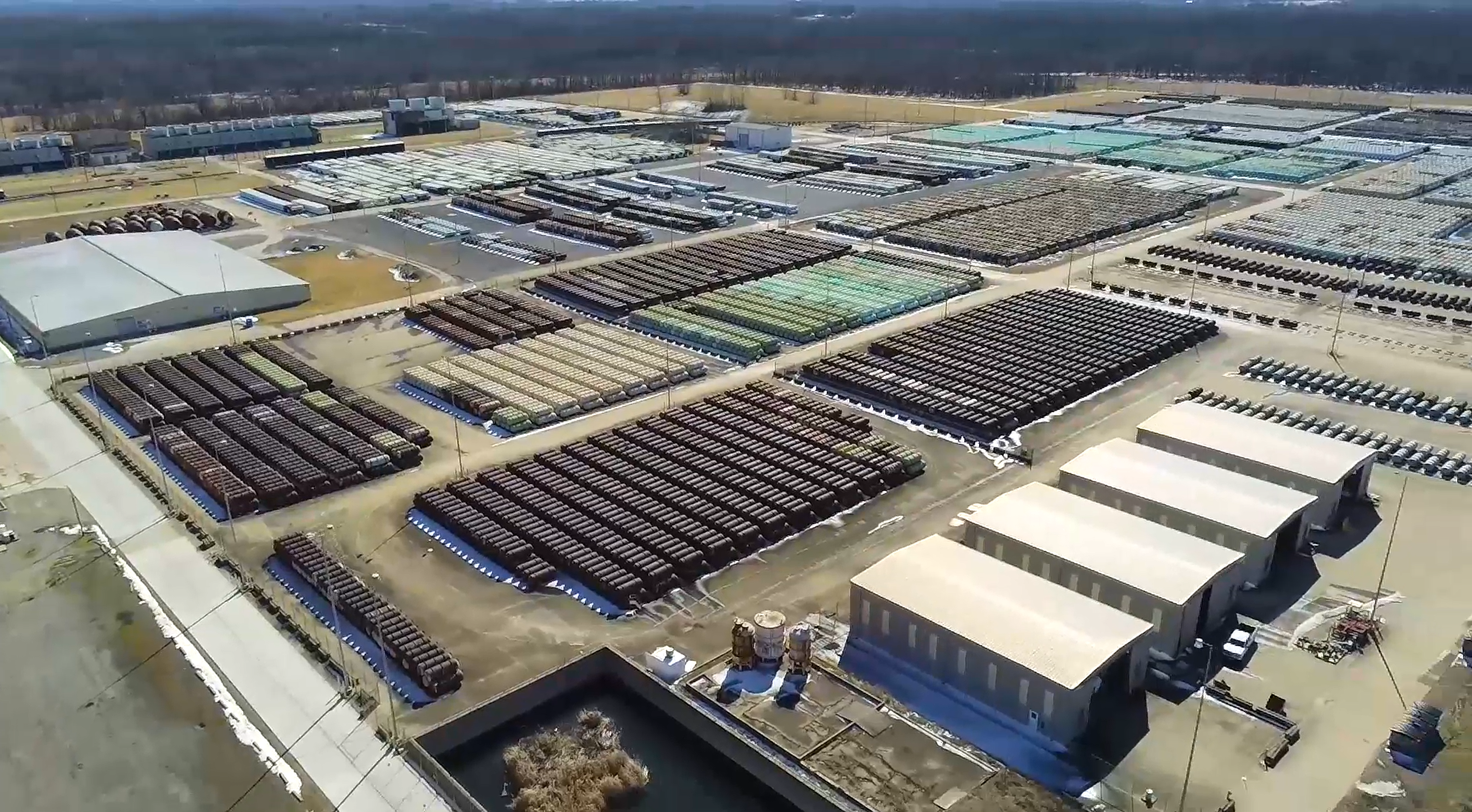 Aerial DOE photograph of depleted uranium cylinder storage yards and facility buildings at Paducah, Kentucky