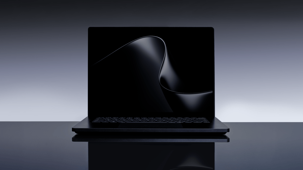 Microsoft Surface Laptop Ultra shown open in an official press image, illustrating the premium PC market during the Q3 2026 shipment downturn.