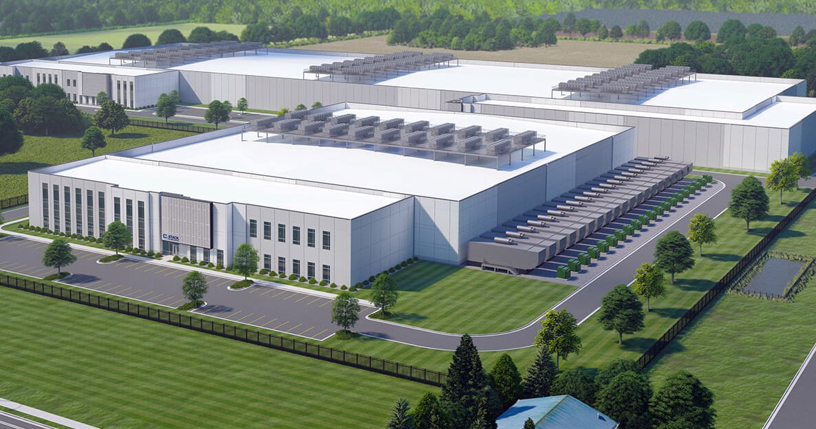 Rendering of STACK Infrastructure's POR03 campus in Hillsboro with low-rise buildings, mechanical cooling equipment and landscaping