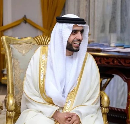 Official Standard Asset Company leadership-page portrait of Sheikh Mohammed Bin Maktoum Bin Juma Al Maktoum seated in white traditional Emirati attire