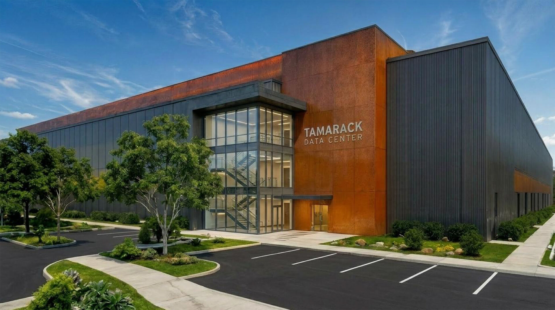 Starwood's architectural concept of a modern Project Tamarack building with rust-colored facade and glass lobby