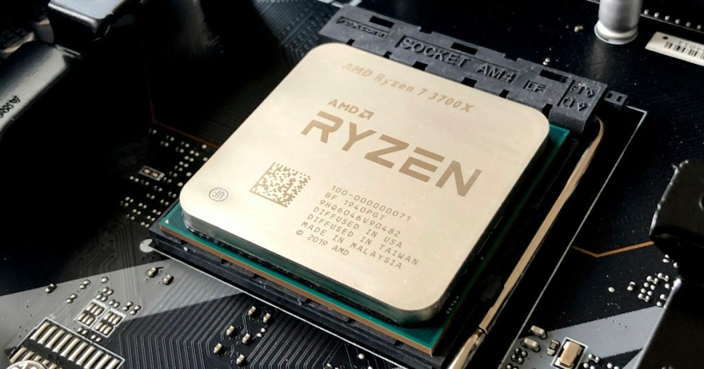 Close-up of a computer processor and motherboard hardware representing application requests entering the operating system kernel.