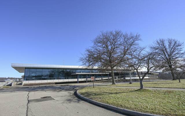 Existing glass-fronted building at TECfusions' former Alcoa research campus in Upper Burrell