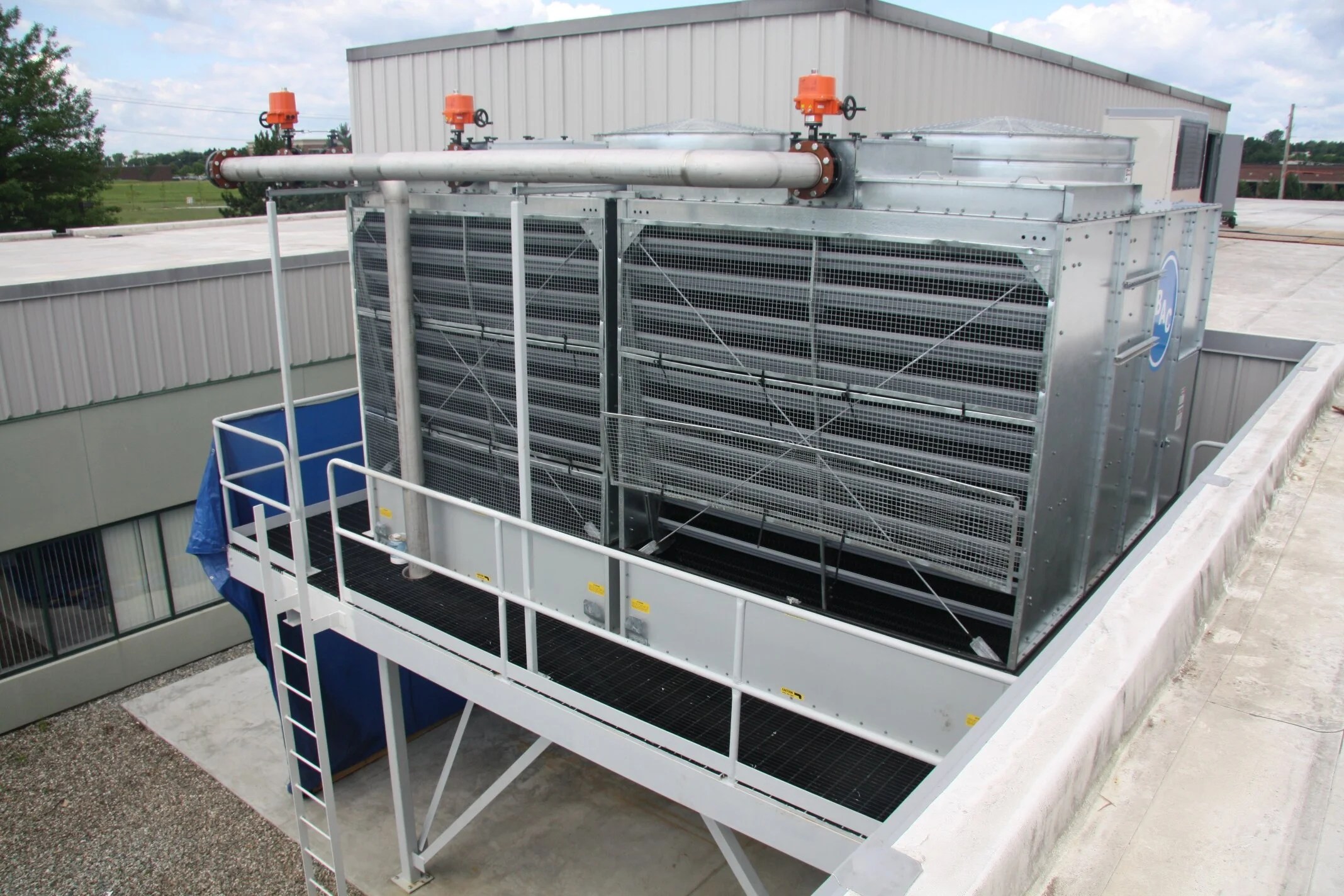 Industrial water-cooled tower equipment and pipes installed for the Tech Vault South Burlington data center