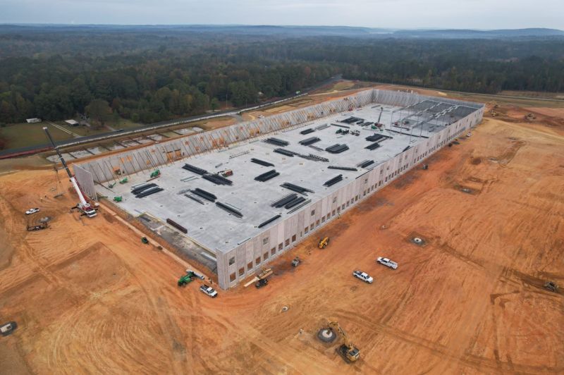 Earlier photograph of an industrial warehouse under construction at Triangle Innovation Point West in Chatham County