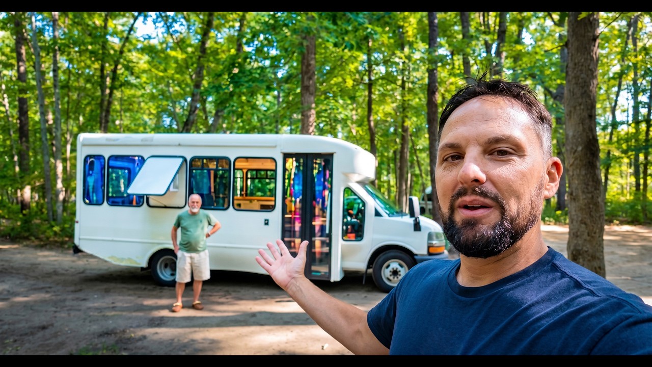 Video still showing the veteran-built shuttle bus camper featured by New Jersey Outdoor Adventures.