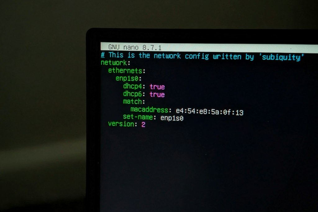 Computer screen showing terminal and network configuration output in a technical workspace.